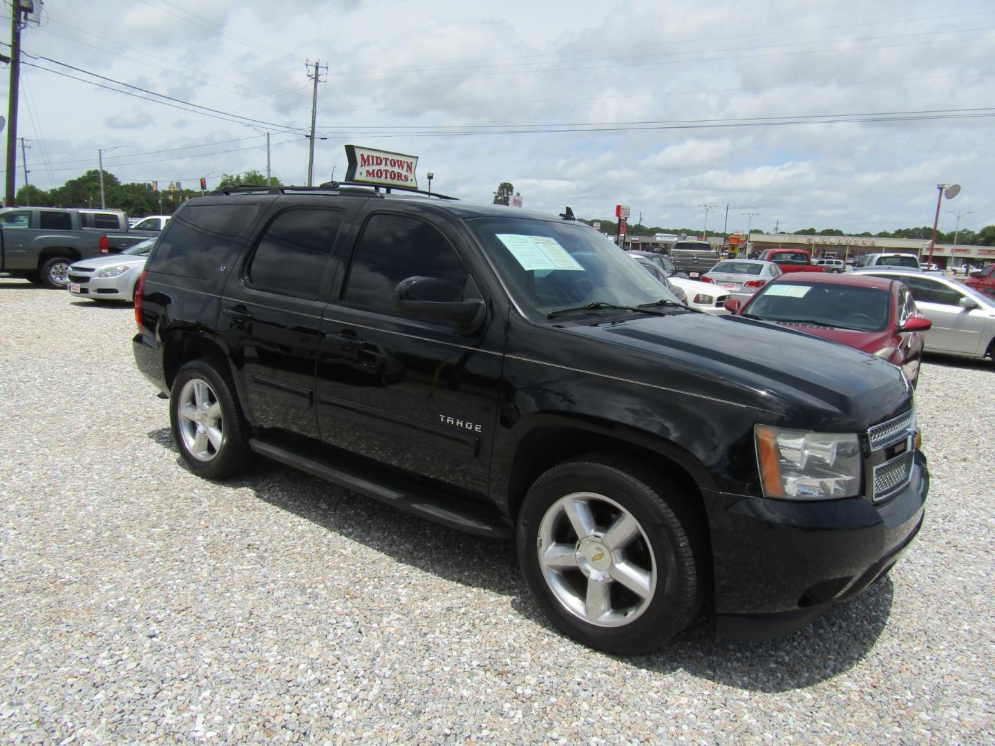 2014 Black /Tan Chevrolet Tahoe (1GNSCBE00ER) with an V8 engine, Automatic transmission, located at 15016 S Hwy 231, Midland City, AL, 36350, (334) 983-3001, 31.306210, -85.495277 - Photo#0